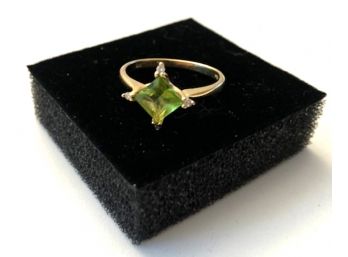 Beautiful 14K Ring With Topaz And 4 Small Diamond Chips