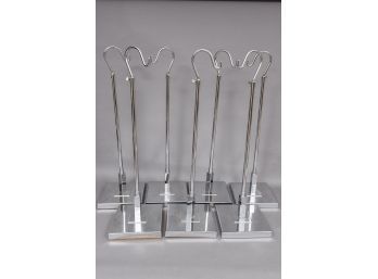 Collection Of Seven Chrome Adjustable Display Stands