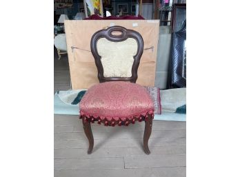 Vintage Boudoir Chair With Unique Upholstery And Tassels