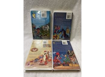 Lot Of 4 Walt Disney VHS Movies: Toy Story (2000), Sleeping Beauty (1997), Peter Pan (1998), The Tigger Movie