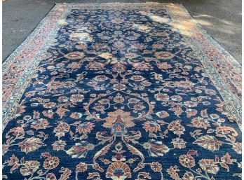 A large Persian hand knotted wool carpet, Blue/cream rug