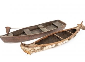 Two vintage wooden handcrated canoes