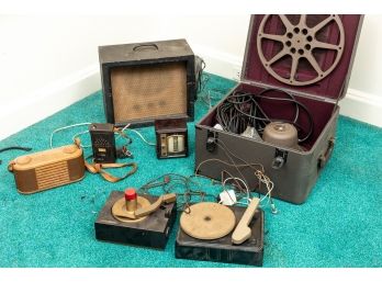 Collection of vintage RCA players, radio, tele-vision clock,  Bell and howell speaker and amp