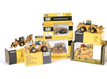 6 Die Cast Cat Trucks With Boxes