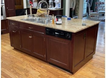 A Mahogany Kitchen Island With Sink And Granite Counters!