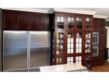 A Wall Of Mahogany Cabinets