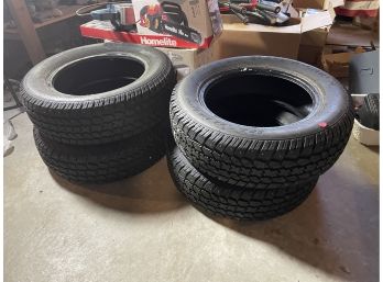 4 LIKE NEW STUDDED SNOW TIRES