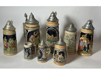 SEVEN VINTAGE GERMAN STEINS