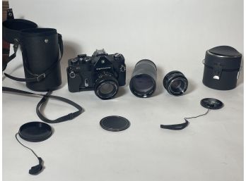 AN ARGUS COSINA CAMERA WITH THREE LENSES