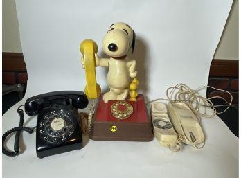 A SNOOPY PHONE AND A ROTARY PHONE