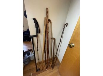 LOT OF WALKING AND HIKING STICKS