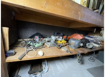 LARGE LOT OF POWER TOOLS UNDER BENCH