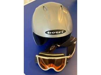 A Ski Helmet   By Boeri And Ski Goggles By Smith