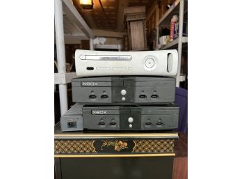 Group Of 3 Xbox Consoles (unknown Condition - No Wires)