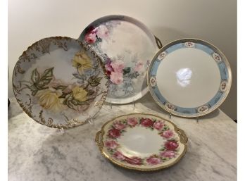 Four Porcelain Serving Plates