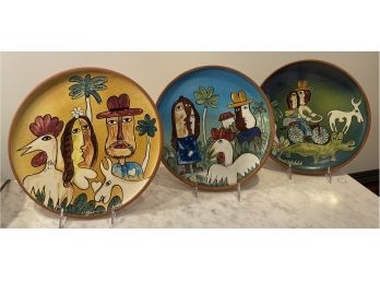 Three Decorative Terra Cotta Plates Signed