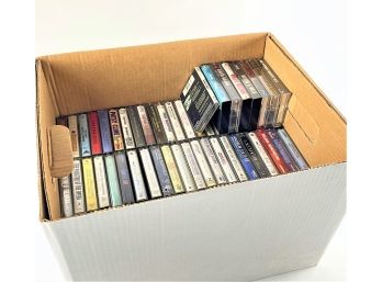 9 - Cassettes - Over 100.  Plus Two Cassette Organizers