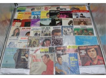 1 BINDER OF 45RPM RECORD SLEEVES (ELTON JOHN, NEIL DIAMOND)