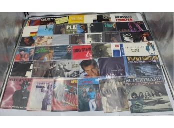 2 BINDERS OF 45RPM RECORD SLEEVES (qUEEN, MADONNA, ARETHA FRANKIN)