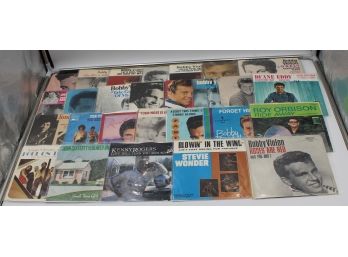 BINDER OF 45RPM RECORDS IN SLEEVES (STEVIE WONDER, KENNY ROGERS, BOBBY VINTON)