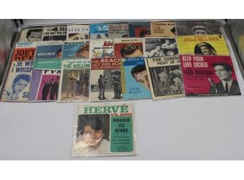 BINDER OF 45RPM RECORDS IN SLEEVES (THE ROLLING STONES, THE BEACH BOYS)