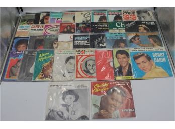 BINDER OF 45RPM RECORDS IN SLEEVES (ELVIS, BOB SEGAR)