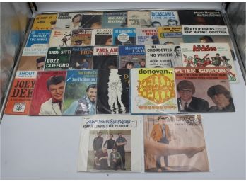 BINDER OF 45RPM RECORDS IN SLEEVES (PAUL ANKA, TOMMY JONES)