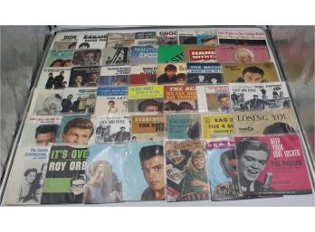 BINDER OF 45RPM RECORD SLEEVES (THE BEATLES, DOLLY PARTON)