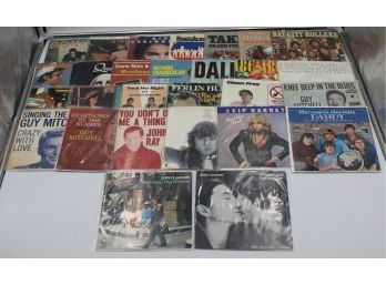 VINYL RECORDS 45RPM MISCELLANEOUS IN BINDER (JOHN LENNON, BON JOVI)