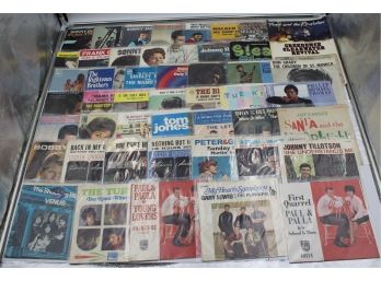 BINDER OF 45RPM RECORD SLEEVES (THE BEATLES, PRINCE)