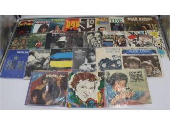 BINDER OF 45RPM RECORDS IN SLEEVES (THE POLICE, LL COOL J)