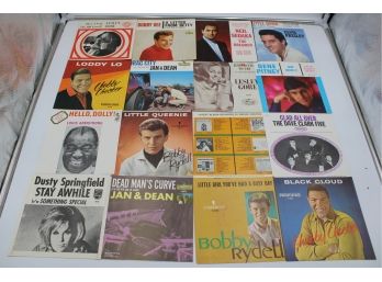 7 BINDERS OF 45RPM RECORD SLEEVES (ELVIS, THE BEATLES)