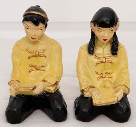 1950s A Universal Original Chalkware Chartreuse Boy And Girl Book Studying Figurines