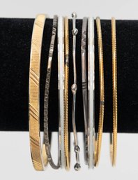 9 Gold And Silver Tone Bracelets