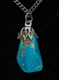 Turquoise Free Form Pendant On Silver Tone Chain