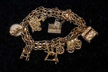 Sterling Charm Bracelet, Featuring Covered Wagon, Antique Stoves, And Trolley Car