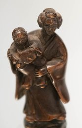 Japanese Carved Wood Netsuke Of Woman Holding A Child. Early Showa Period 1926-1936