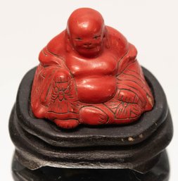 Chinese Carved Cinnabar Seated Buddha Raised On Circular Wood Stand #1