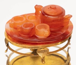 Orange Swirl Glass Miniature Tea Set On Metal Stand