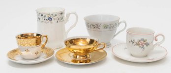 Porcelain Tea And Demitasse Cups And Saucers