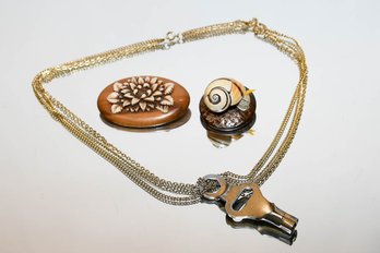 Vintage Skate Key Necklace, Snail Pin, And Flower Pin
