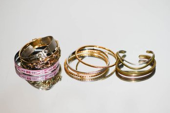 Eight Bangle Bracelets With Brands Including Safari And Monet