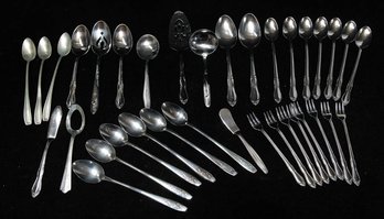 Assortment Of Stainless Serving And Flatware Pieces