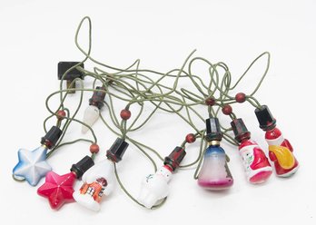 1940s Milk Glass Strand Of Holiday Lights Including Stars, Bell And Snow Covered House