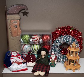 Christmas Decor Including Santas And Oversized Ornaments