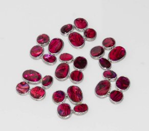 4 Leaf Ruby Colored Glass Embellishments In Silver Tone