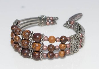 Multi Strand Seed And Metal Stretch Bracelet