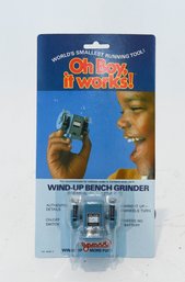 1981 Oh Boy, It Works! Wind-Up Bench Grinder