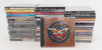 CD Lot Includes The Eagles, Sting, Paula Abdul And Santana