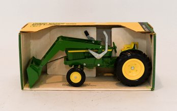 ERTL John Deere Utility Tractor With End Loader 1/16 Scale